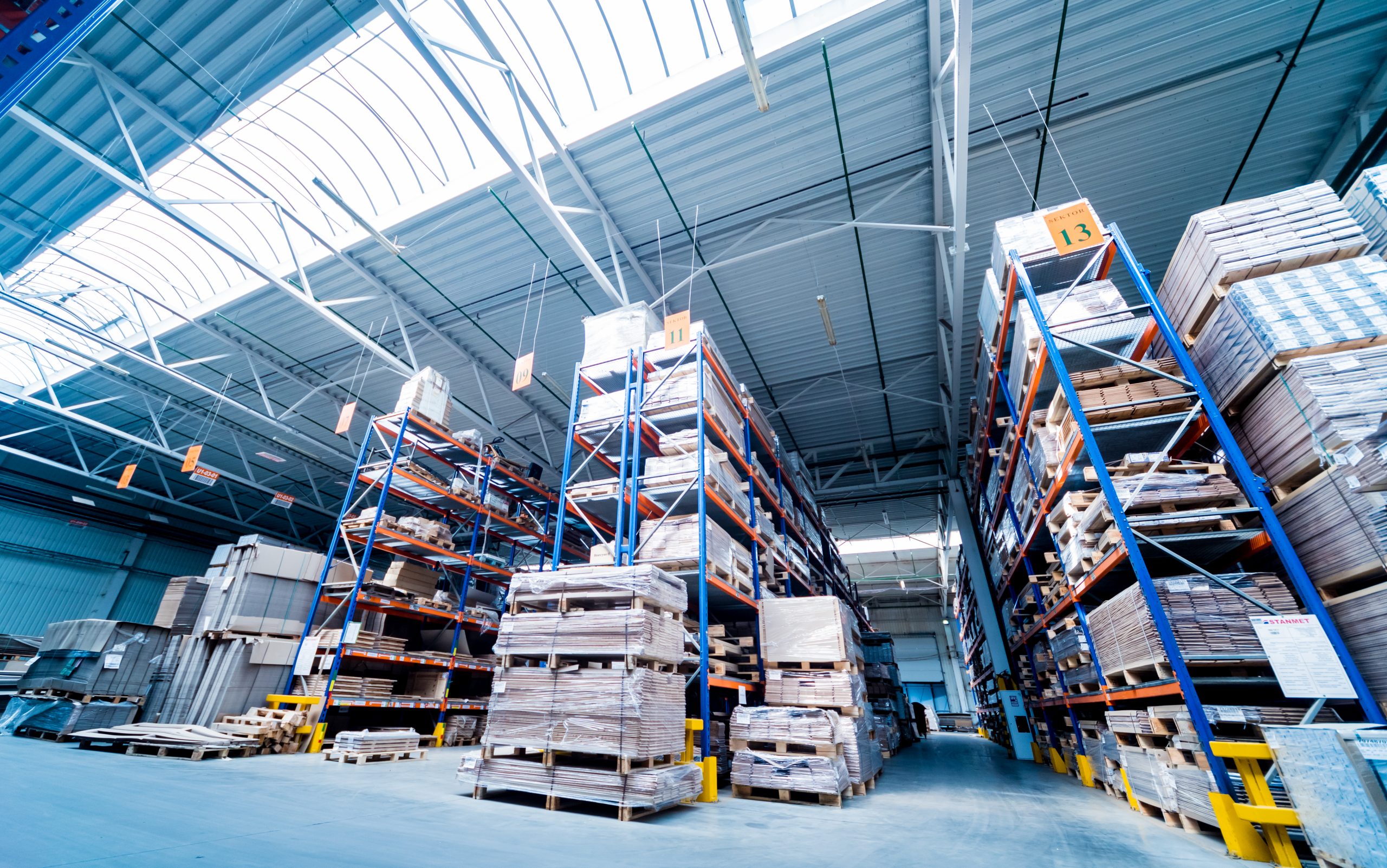 Warehouse,Industrial,Company.,Commercial,Warehouse.,Crates,Stacked,On,The,Shelves.